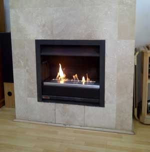 Custom floating shelf to turn wood-burning fireplace into bio-fuel